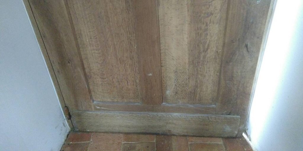 water damaged door